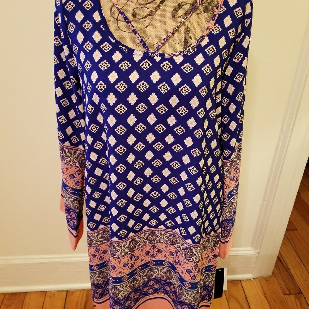 Super cute bell sleeve shift dress.